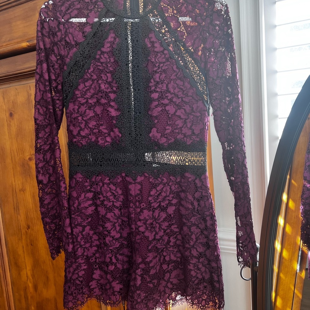 Eva Long-sleeved lace romper in plum
